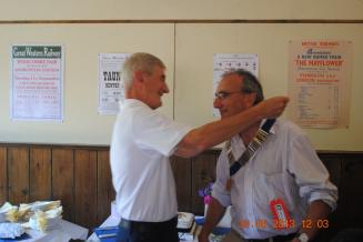 2013 handing over the chain of office by Lion Reg Williams to Lion Twiggy Lake